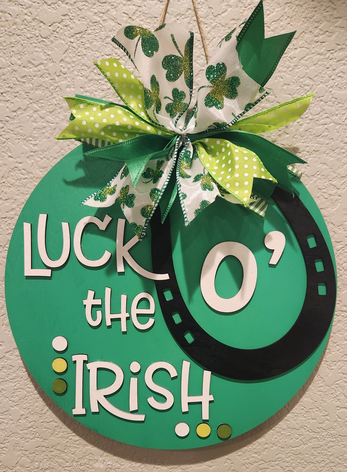 Green and white Luck O' the Irish door sign